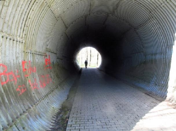 man at end of tunnel
